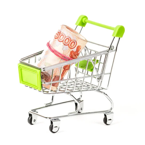 Food trolley, full of Russian 5000 banknotes. On a white background