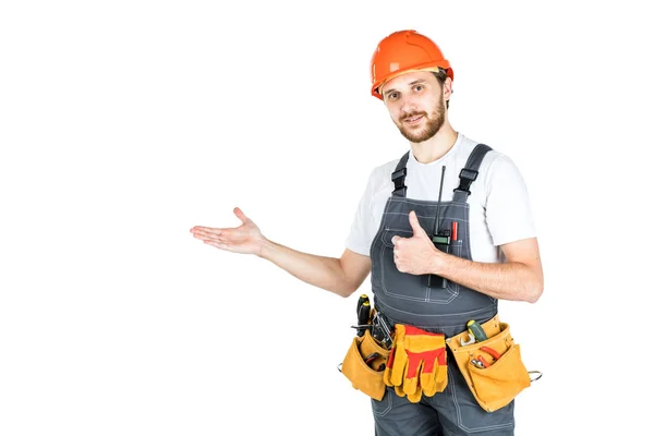 The man builder shows something. Isolated over white background. — Stock Photo, Image