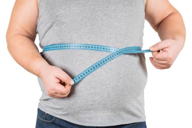 Kalın olgun adam ölçüm karın mavisi ölçüm bandı, beyaz arka plan üzerinde izole.