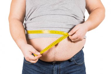 Göbek izole bant ölçme sarı ölçme kalın olgun adam 