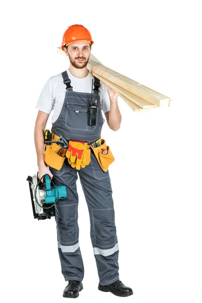 A construction man with boards or laminate in his hands. Repair — Stock Photo, Image