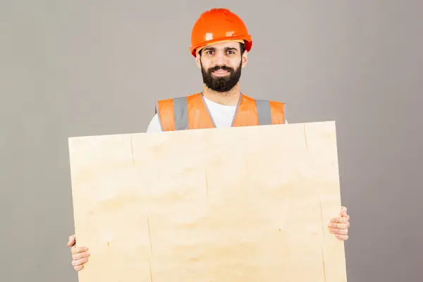 Builder Worker Protective Helmet Sheet Plywood Gray Background — Stock Photo, Image