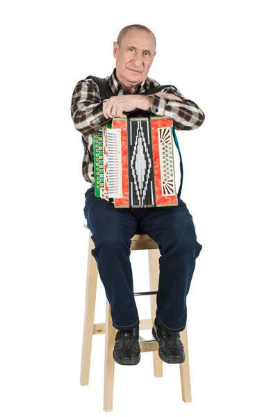 Portrait of a man, grandfather playing the accordion. Isolated o — Stock Photo, Image