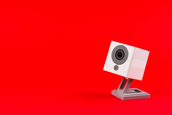 Webcam branco em um fundo vermelho, objeto, Internet, tecnologia c — Fotografia de Stock
