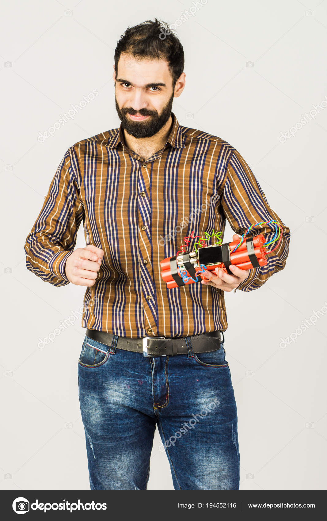 Arab Man With A Dynamite In His Hands Isolated On White Backgro