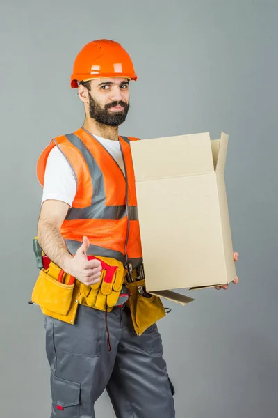 Construtor Homens Com Capacete Laranja Com Uma Caixa Papelão Nas — Fotografia de Stock