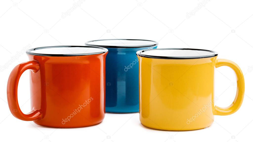 metal mugs on a white isolated background.
