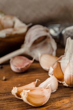 some cloves of garlic with pieces. kitchen concept