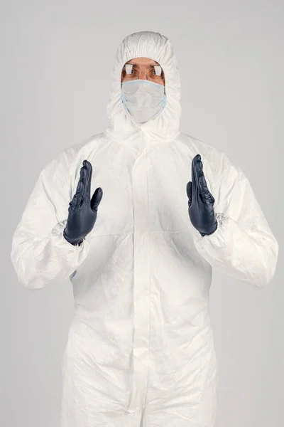 Human Epidemiologist Disposable Epidemic Antibacterial Isolation Suit Shows Hand Gestures — Stock Photo, Image