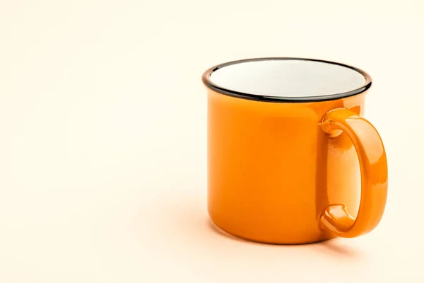 Empty Iron Mug Yellow Background — Stock Photo, Image