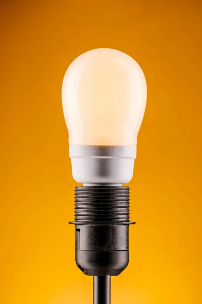 Lámpara Sobre Fondo Amarillo Concepto Electricidad — Foto de Stock