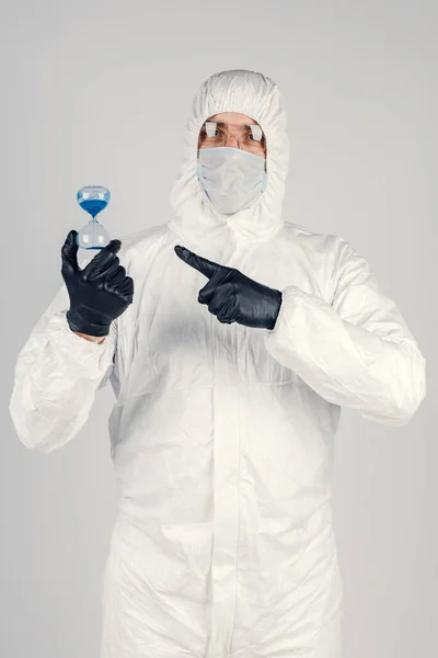 Man White Protective Suit Mask White Background Watch His Hands — Stock Photo, Image