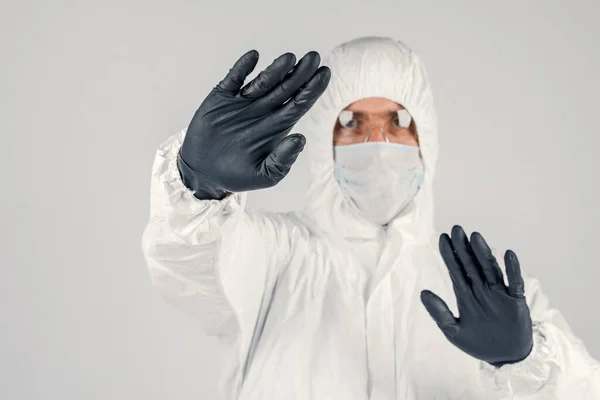 Human Epidemiologist Disposable Epidemic Antibacterial Isolation Suit Shows Hand Gestures — Stock Photo, Image