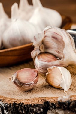 some cloves of garlic with pieces. kitchen concept.