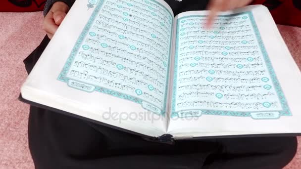 He reads the Qur'an at home 2. — Stock Video