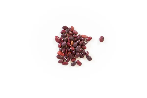 Red beans scattered on the white background — Stock Photo, Image