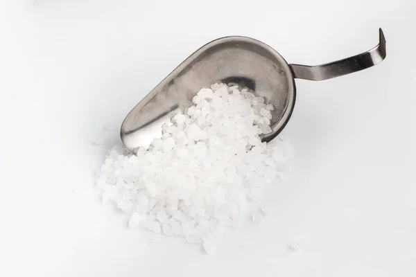 Sea salt in an iron bowl — Stock Photo, Image