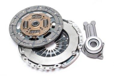 Brand new clutch kit on the white background clipart