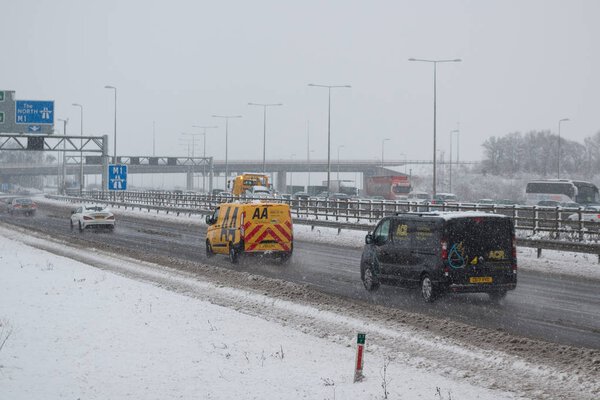 British motorway M1 during snow storm