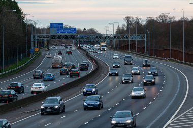 Hunton Bridge, UK - February 23, 2020: Evening traffic on busiest British motorway M25