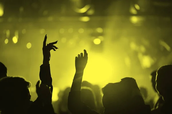 Hands of people in a nightclub — Stock Photo, Image