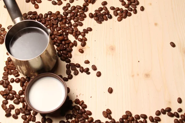 Coffee and milk on the table