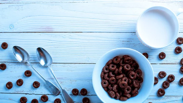 Cereal for Breakfast is on the table. Delicious rings from milk. — Stock Photo, Image