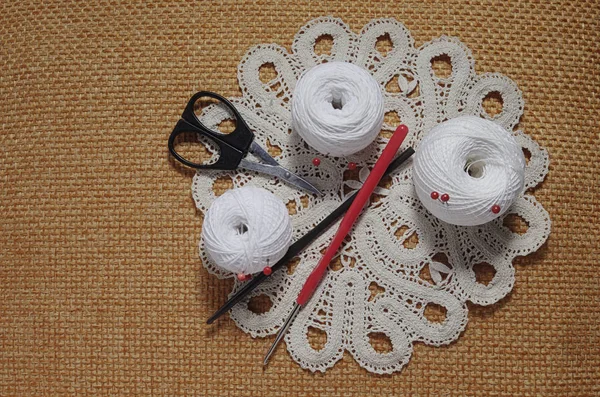 Objects for sewing. Scissors and pins. Hanks thread on mat. Pins — Stock Photo, Image