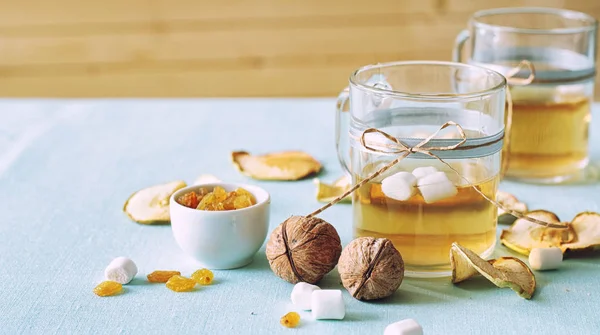 Dried fruits compote. Glass cups with a drink from dried fruits,