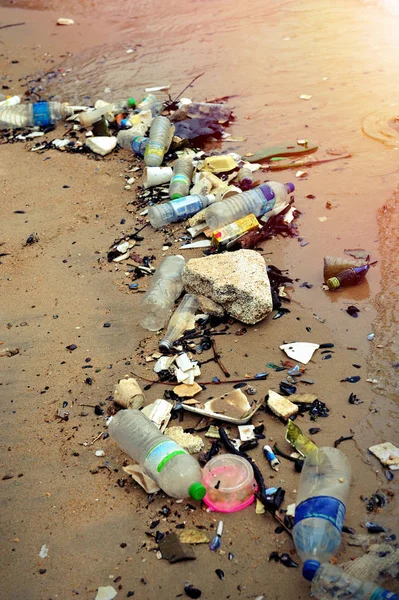 Plastic pollution in ocean (Environment concept), selective focus.