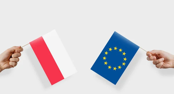 Bandeiras Polónia União Europeia São Mantidas Nas Suas Mãos Mão — Fotografia de Stock