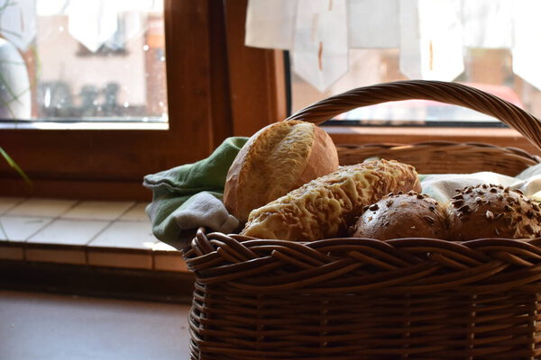 Different pastries are placed in basket - concept with fresh rolls from Germany