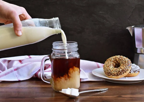 Pour Milk Glass Full Coffee Dark Background Nut Corners Freshly — Stock Photo, Image