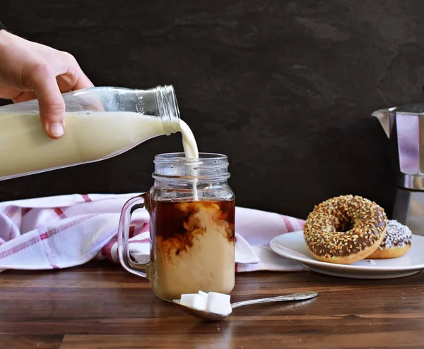 Pour Milk Glass Full Coffee Dark Background Nut Corners Freshly — Stock Photo, Image
