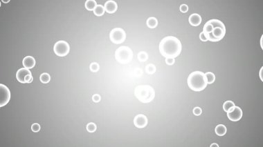 Gri arkaplanı olan mineral baloncukları. Kabarcık parçacıkları yükseliyor