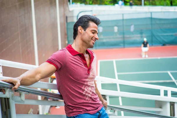 Middle Age Strong, Health American Man thinking by tennis court