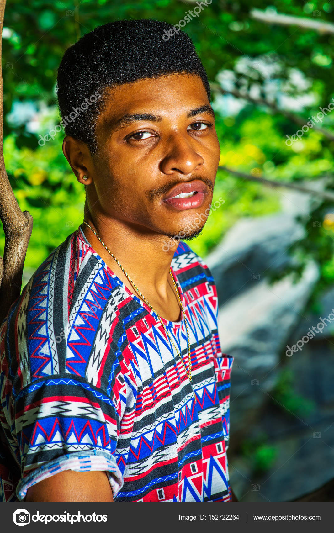 Young African American Man Traveling Relaxing At Central Park