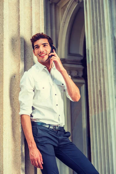 Young American Businessman Calling outside in New York