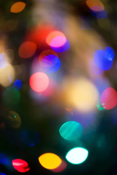 Abstrakt ta av färgglada christmas lights, en bakgrund — Stockfoto
