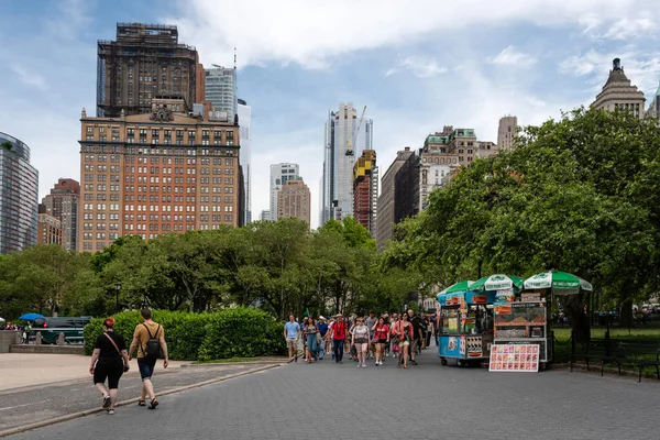 New York, USA - June 7, 2019: view of city buildings in the Manhattan financial district from Battery Park — Stock Photo, Image