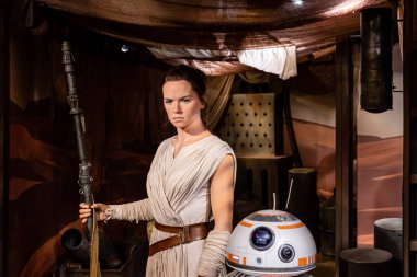 London, England, UK - January 2, 2020: Madame Tussauds waxwork museum. Daisy Ridley as Rey from Star Wars The Last Jedi, Realistic lifelike model clipart