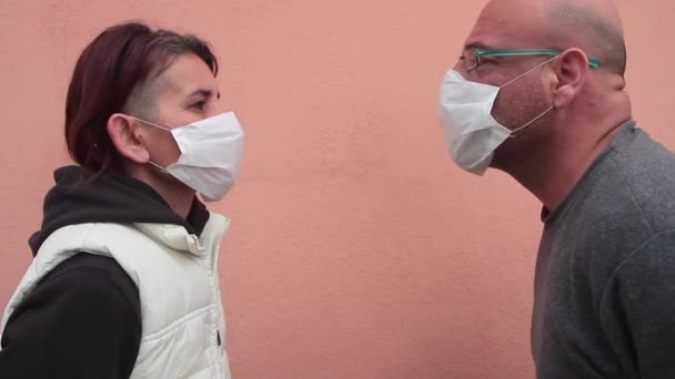 Kissing Woman Man Wearing White Health Masks Defying Virus Type — Stock Video