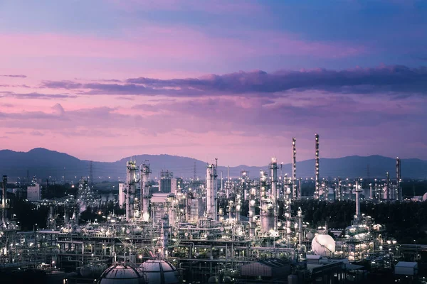 Glitter lighting of petrochemical plant with sunset sky background, Estate industry of fossil petroleum