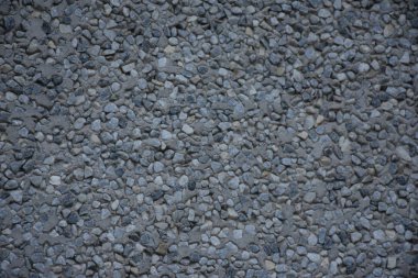 Sahilde deniz taşları, doku ve arka plan.