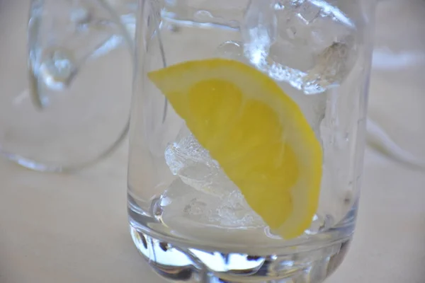 lemon and ice in a glass glass,
