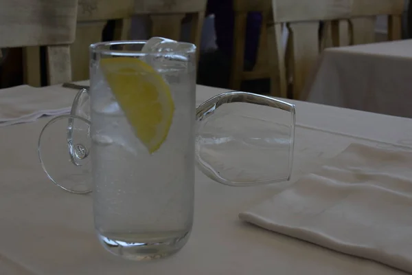 lemon and ice in a glass glass,
