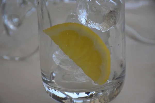 lemon and ice in a glass glass,