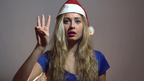 Beautiful Sexy Blonde Girl in Blue Dress Celebrating New Year in Studio with light Background. Video motivasi — Stok Video