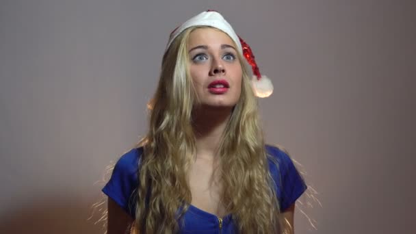 Beautiful Sexy Blonde Girl in Blue Dress Counting three Seconds Until New Year in Studio with light Background. — Stok Video