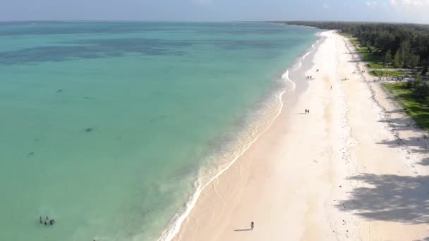 Flying by the Paradise tropical Paje beach at East Zanzibar island aerial view. Tanzania, Africa — Stock Video